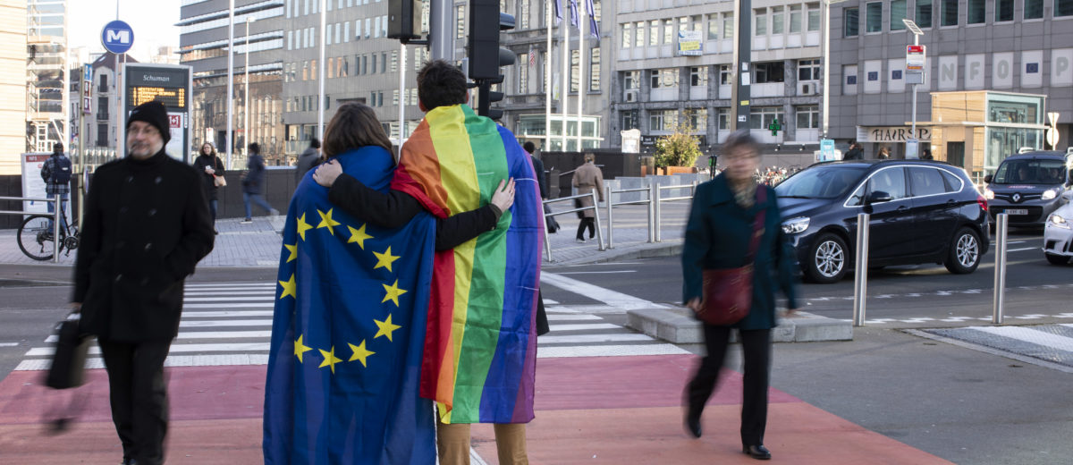 Young people with EU and LGBT flag
